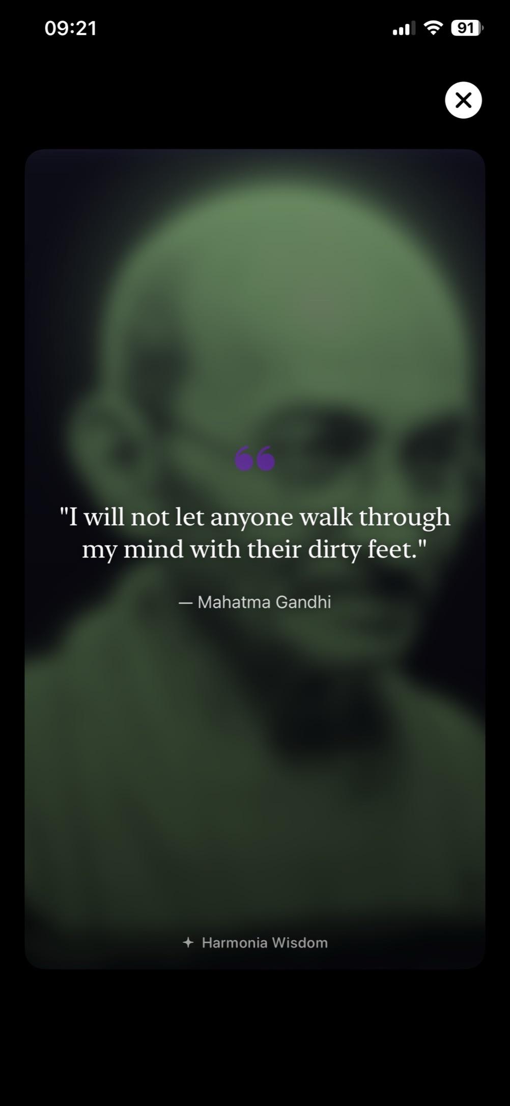 Share card: a Gandhi quote set over a soft, blurred portrait of him.